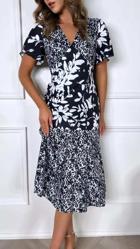 Trendy and versatile Frieda Black and White Floral Tiered Midi Dress
